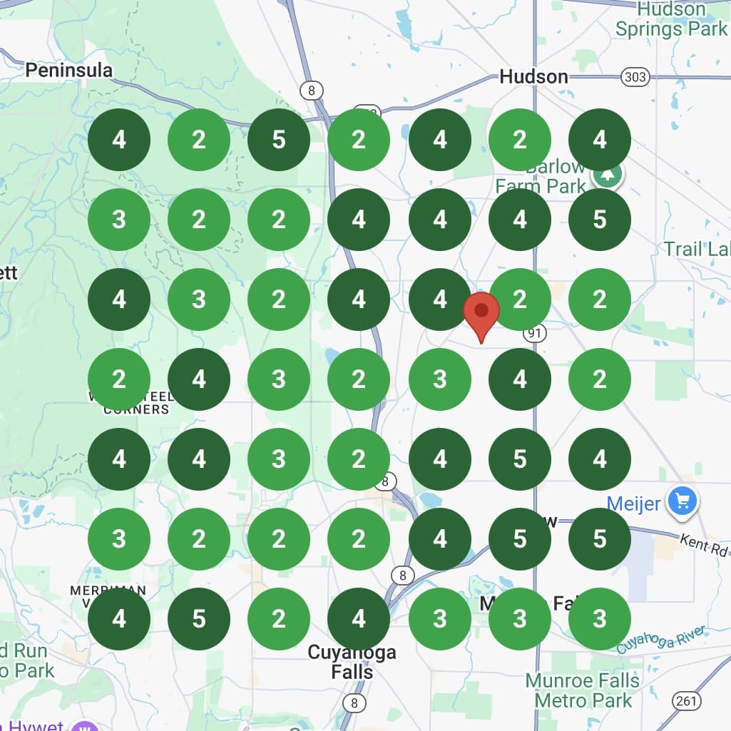 Plumber working under sink with Google search results showing high ratings